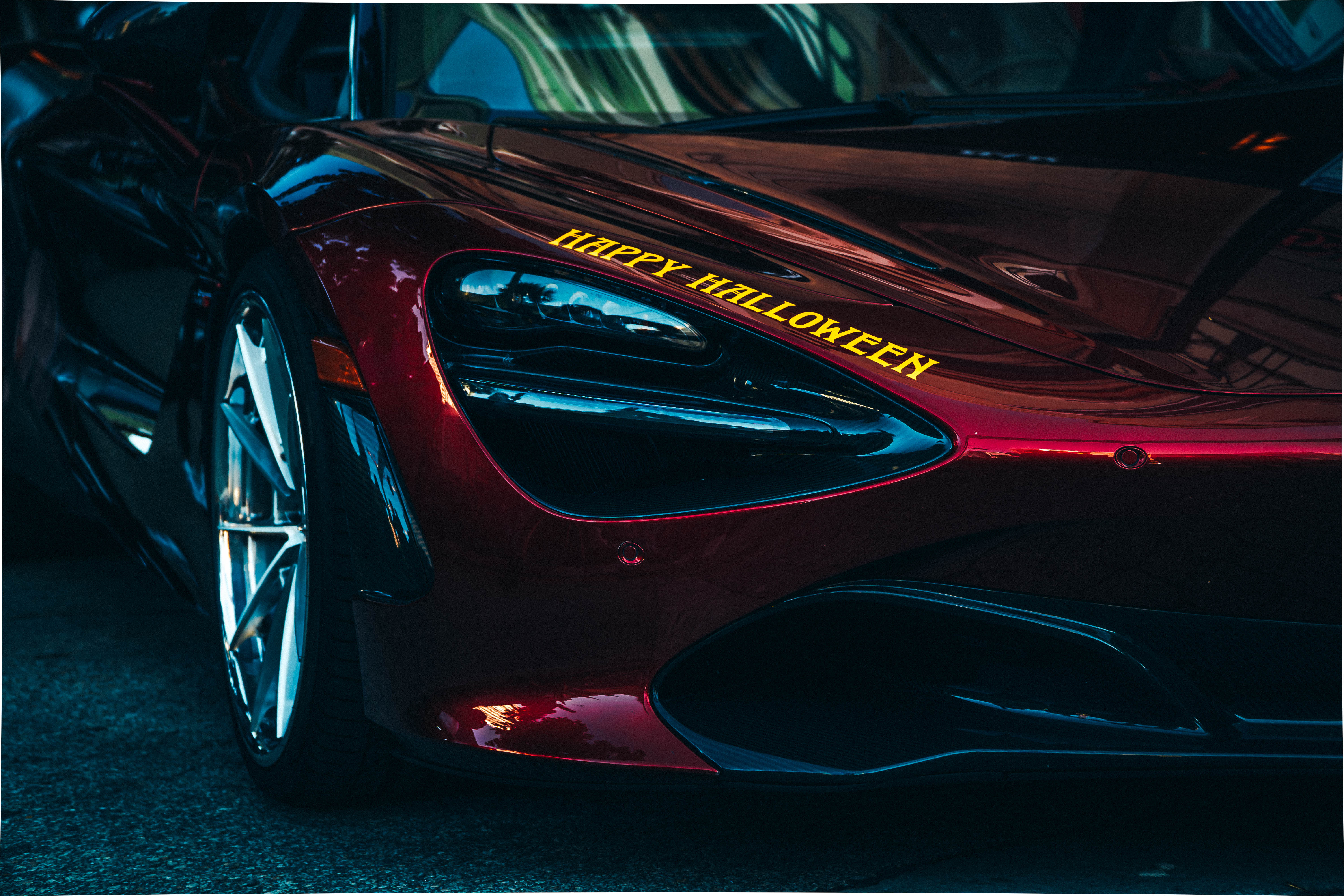 Red McLaren 720S with Happy Halloween text